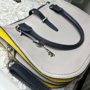 Gray navy and yellow color block fossil crossbody bag